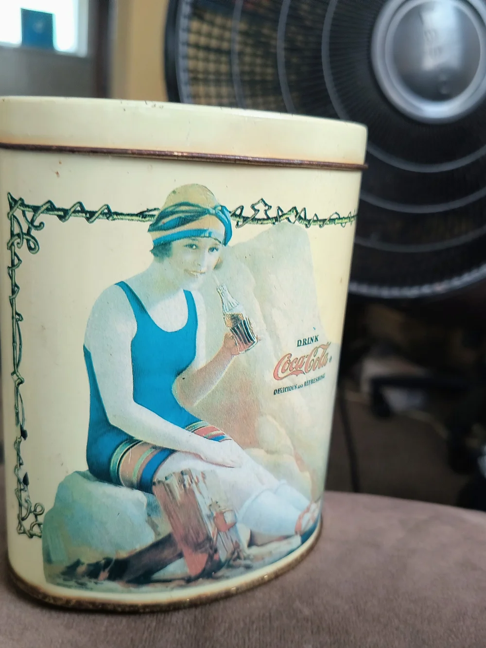 1989 Coca Cola Cream Tin with Teal Illustration